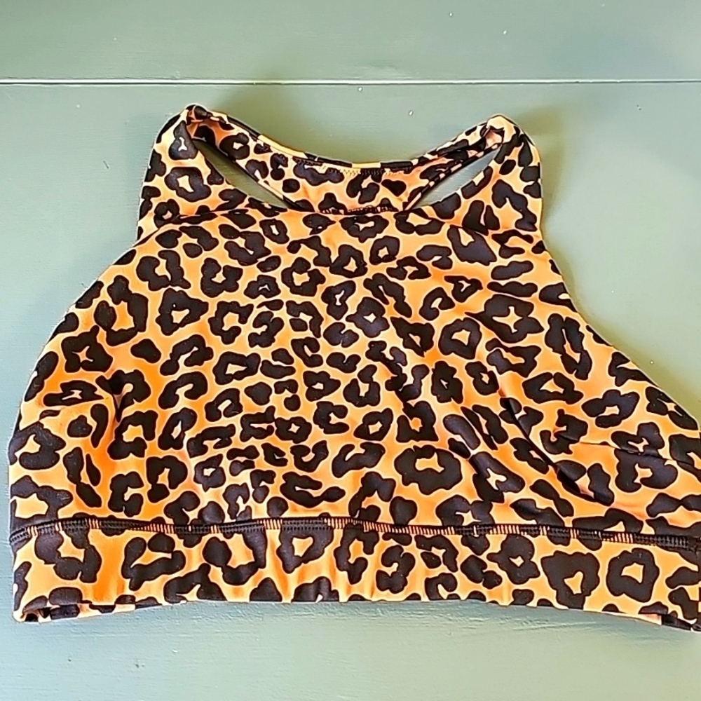 Designed by Fittin, active wear sports/dra,‎ size large. Animal Print. Nice cond